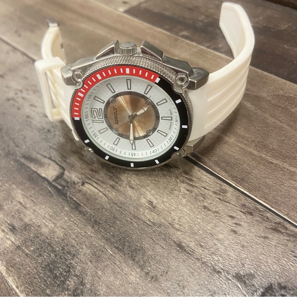 Source Unknown Silver watch with white band